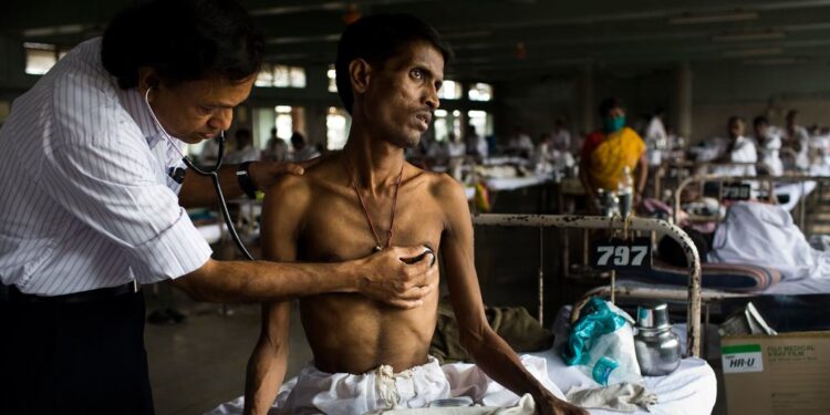 A Tuberculosis patient being examined by a doctor