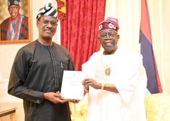President Bola Tinubu and Taiwo Oyedele